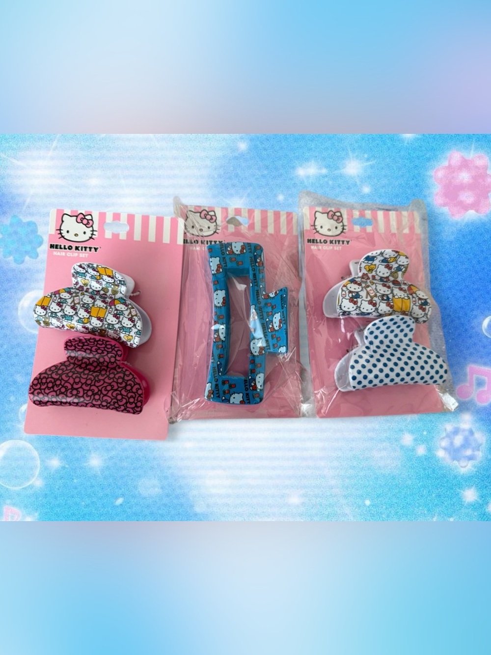 Hello Kitty hair clip set with Hello Kitty characters in various outfits